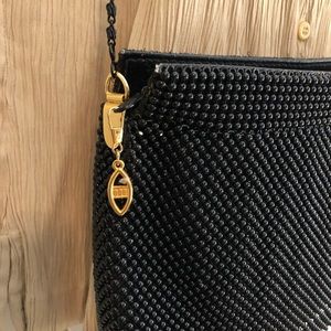 Nice over the shoulder black beaded purse.